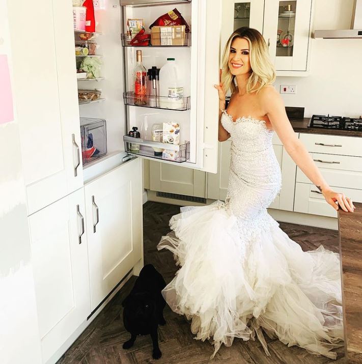 Her white cabinets help make her kitchen look even bigger