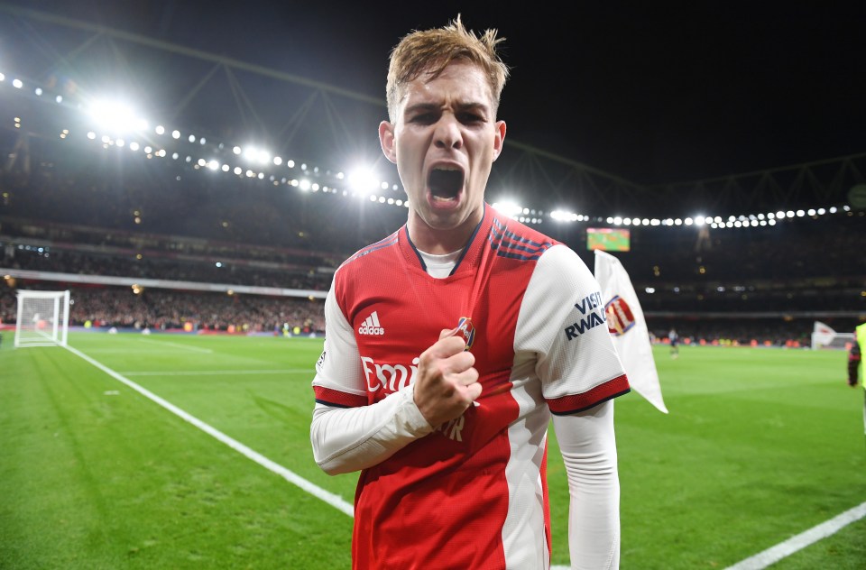 Smith Rowe wheels away in delight after scoring his third goal of the campaign