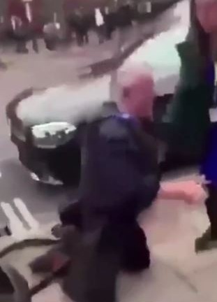 The elderly man was then helped to his feet by shocked bystanders