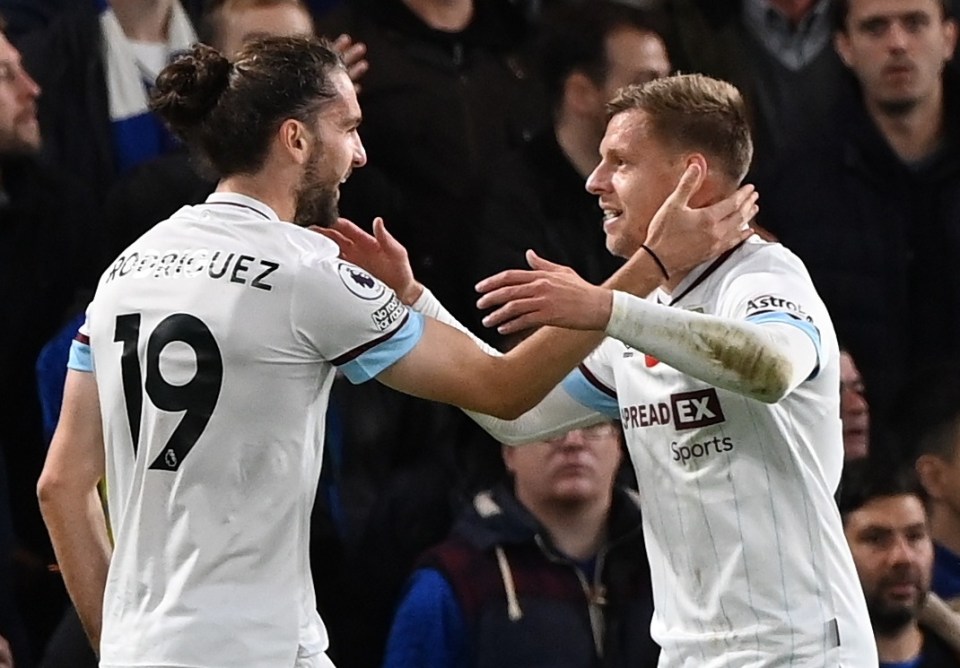 Jay Rodriguez and Matej Vydra celebrate after they combined for Burnley's equaliser