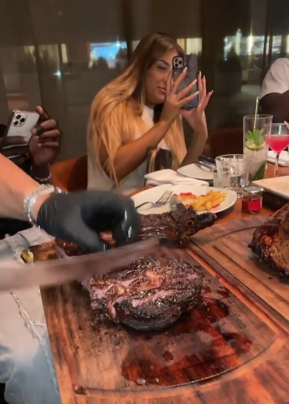 The group chowed down on expensive steaks at the restaurant