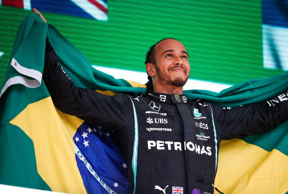 British star Lewis Hamilton hoisted the Brazilian flag after winning the Grand Prix in Sao Paulo