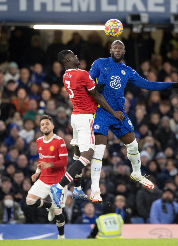 Eric Bailly competes for the ball with Romelu Lukaku