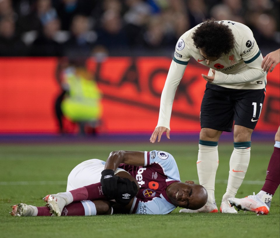 Ogbonna went down midway through the first half of West Ham's game against Liverpool