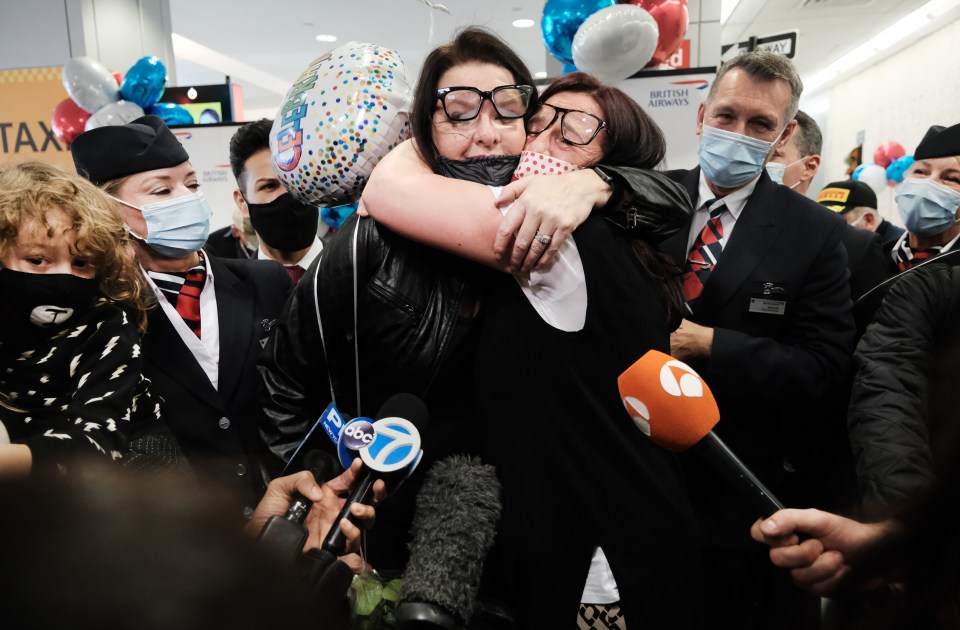 The first flights landed to cheers in New York as passengers, including sisters Jill and Louise Chambers, counted down the minutes to their reunions