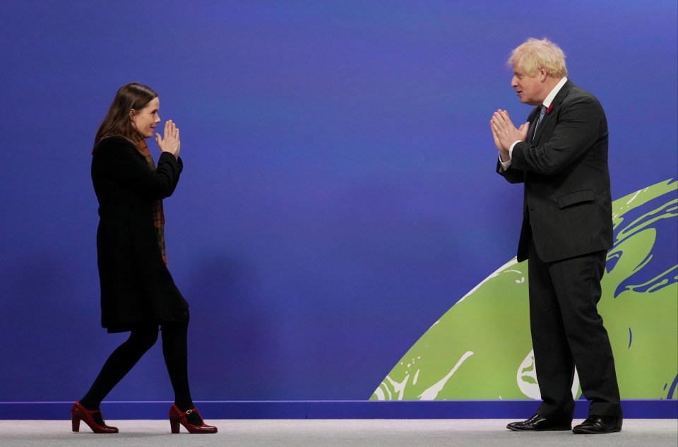 Boris Johnson greets Iceland Prime Minister Katrín Jakobsdóttir