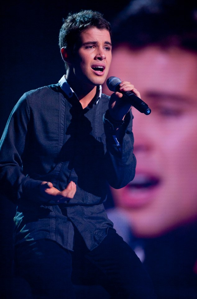 The star performing in the X Factor live show in December 2009