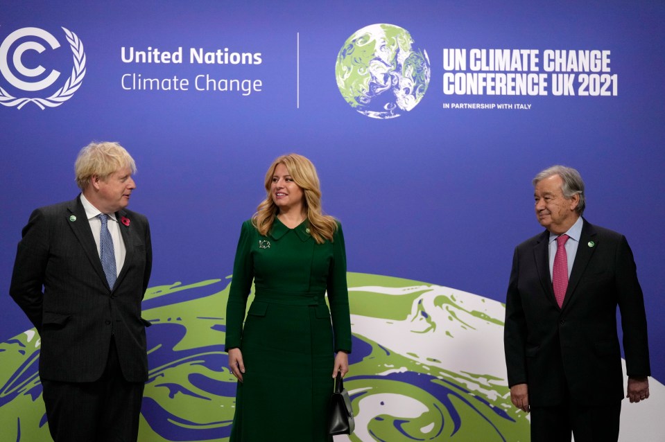 Slovakia's President Zuzana Caputova poses with Britain's Prime Minister Boris Johnson and UN Secretary-General Antonio Guterres