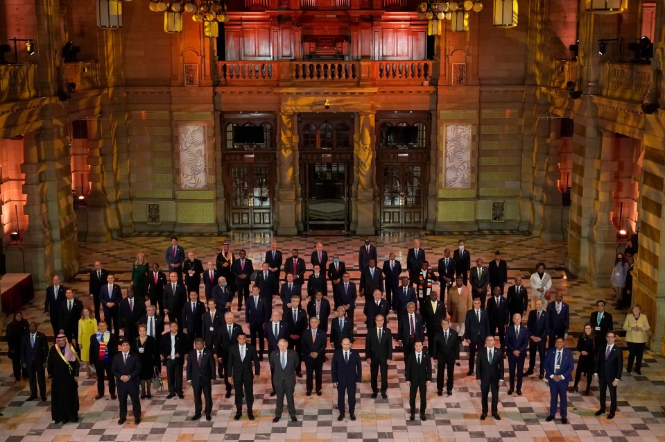 World leaders pose for a group photo at an evening reception at the COP26 climate summit