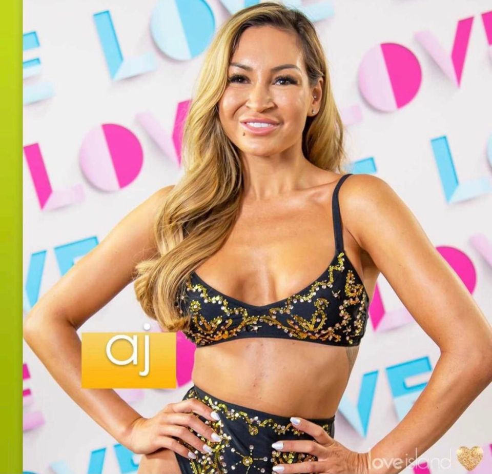 AJ says she hates looking back at her promo shot