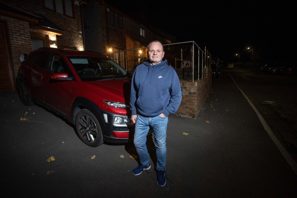 Resident Andrew Pugh in front of his home in Blaina