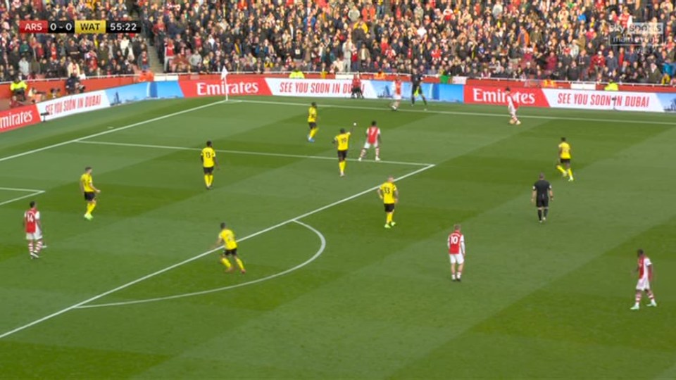 Moussa Sissoko raises his arm in protest as Alexandre Lacazette fails to pass the ball back