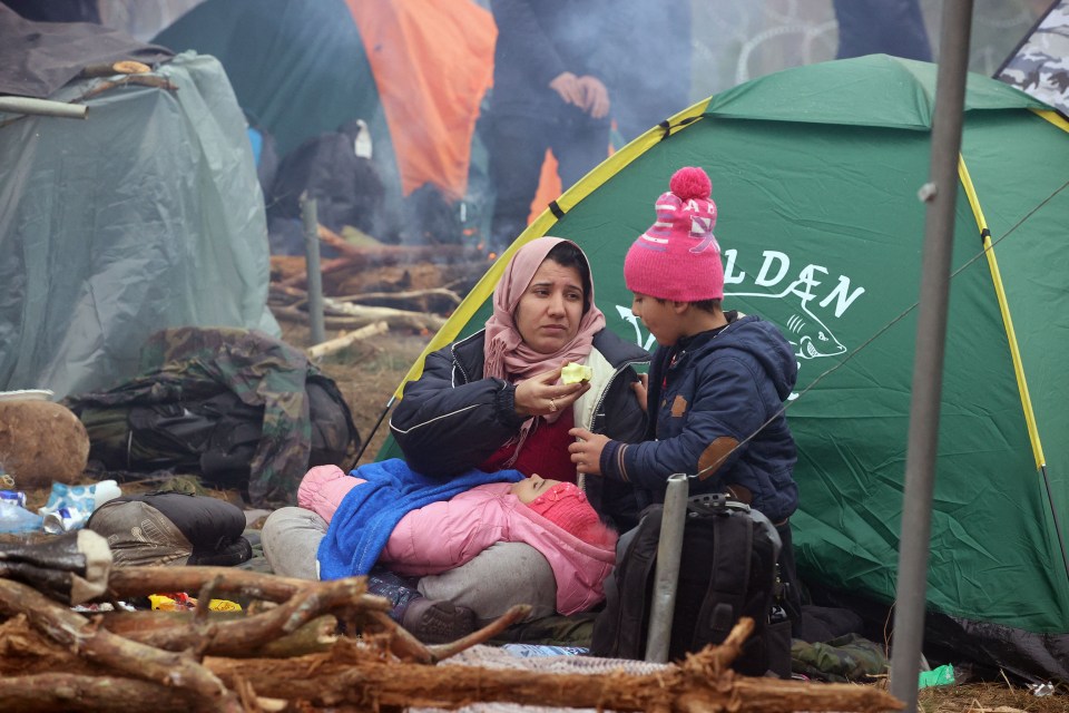 Small children are among those stuck at the border with Poland