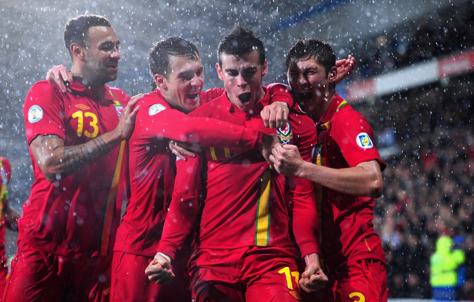 The forward was mobbed by team-mates after his last-gasp winner against Scotland in 2012