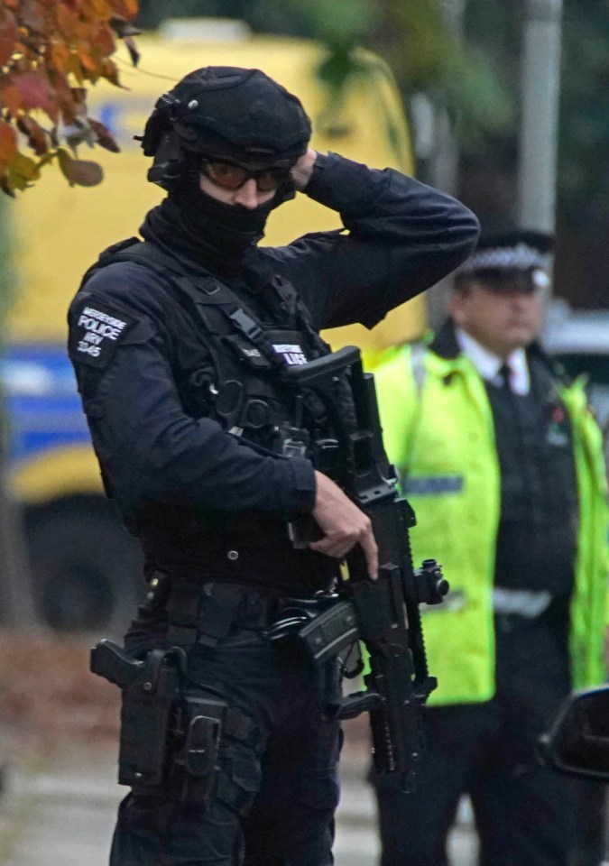 Armed police have swooped on two streets in the city and are reportedly searching addresses