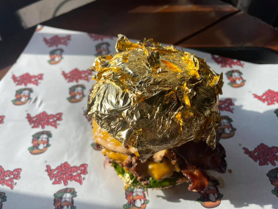 Dope Burger has put a luxury gold-coated burger on it's menu for a neat £100