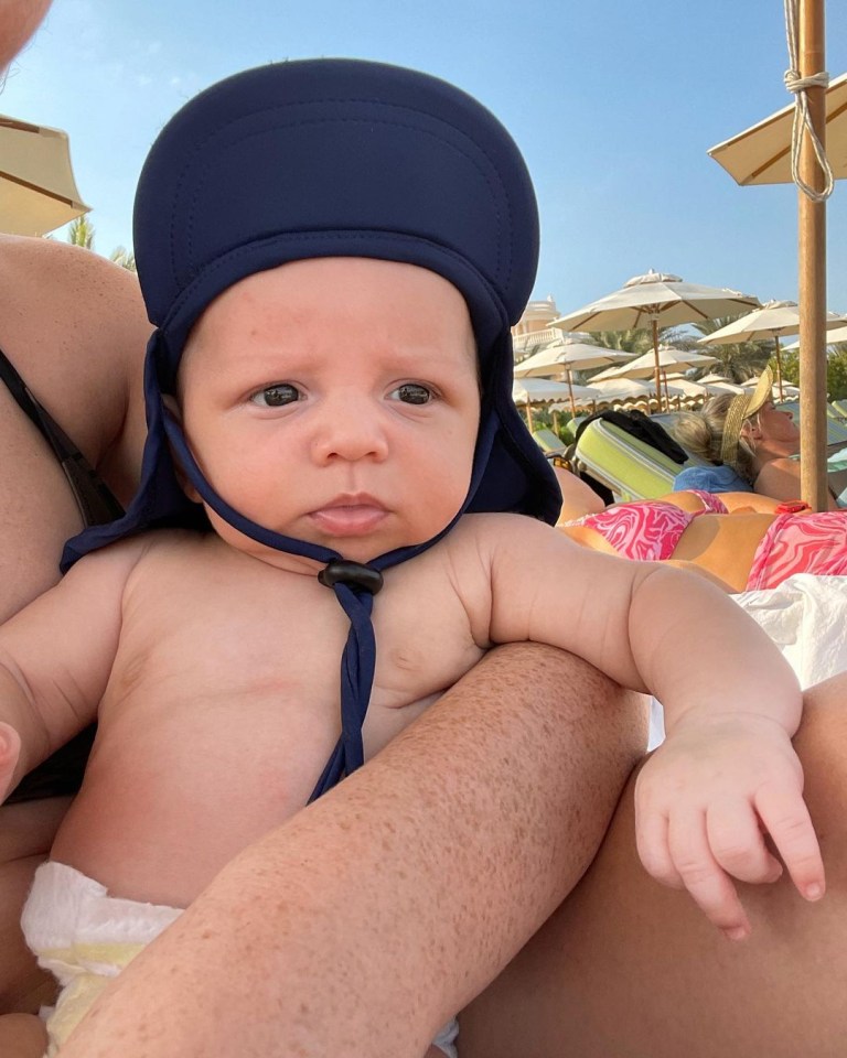 Perrie Edwards has shared pictures from her first family holiday with baby Axel