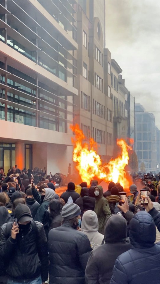 Riots in Brussels as people rally against Covid rules