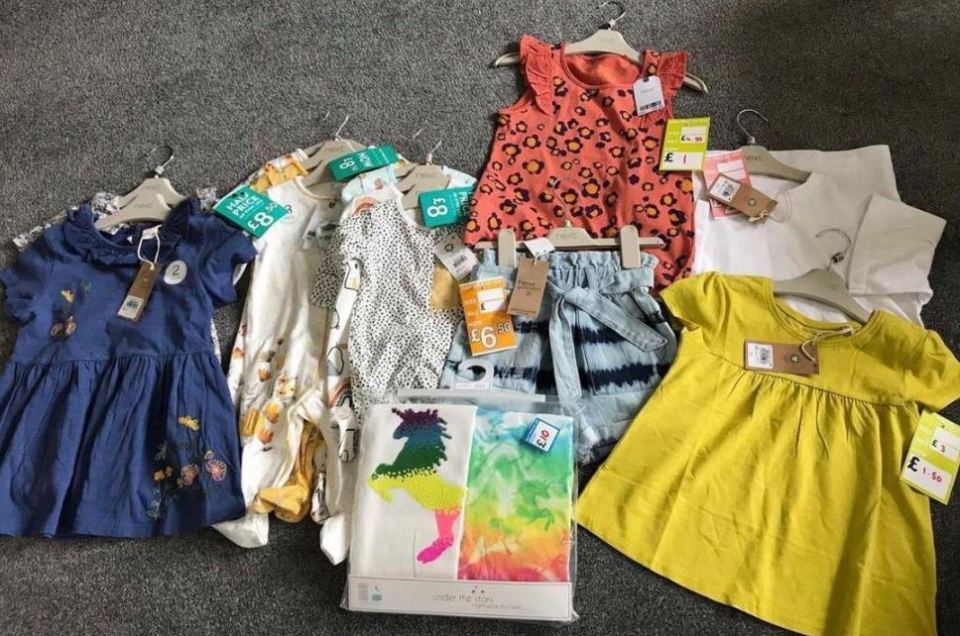 The mum buys clothes for her daughter to grow into