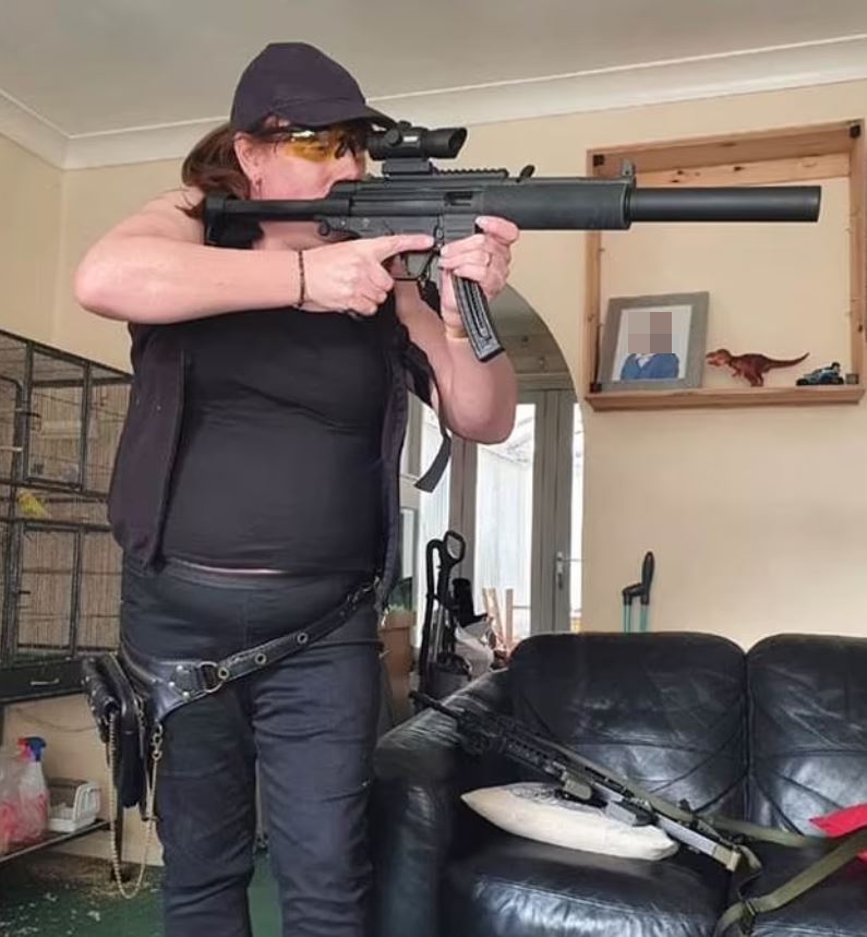 Photographs have emerged of bus driver Monica posing with a fake assault rifle