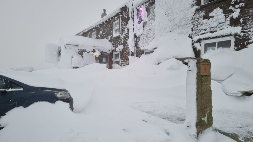 The Tan Hill Inn in Yorkshire - Britain's highest pub - has been buried in enormous snowdrifts