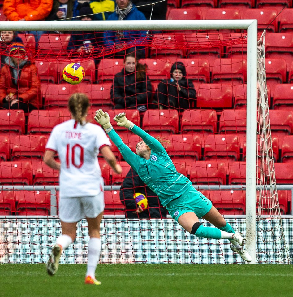 Mary Earps pulled off two quality saves to protect England’s slim lead