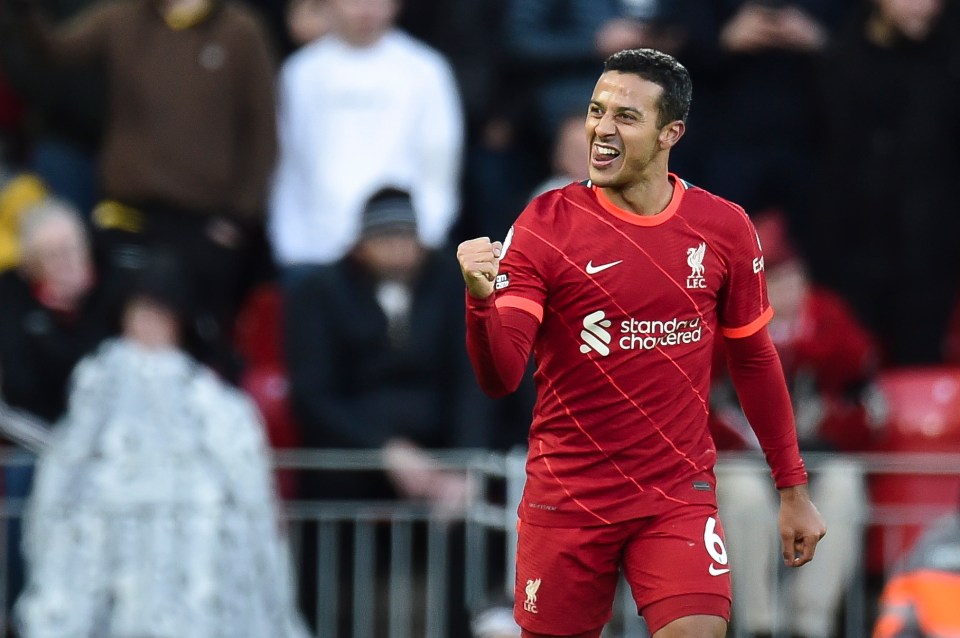 Midfielder Thiago celebrates his strike