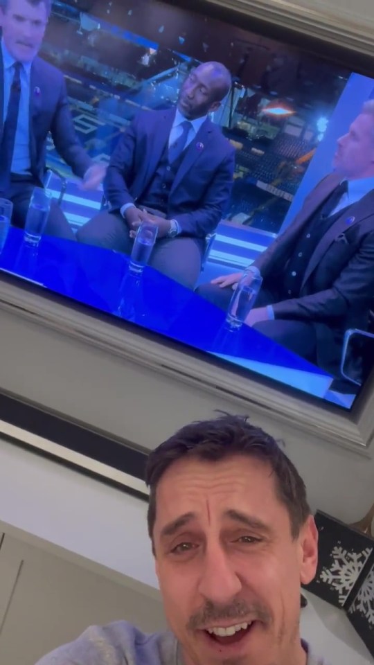 Gary Neville was loving every second of it as he watched from home