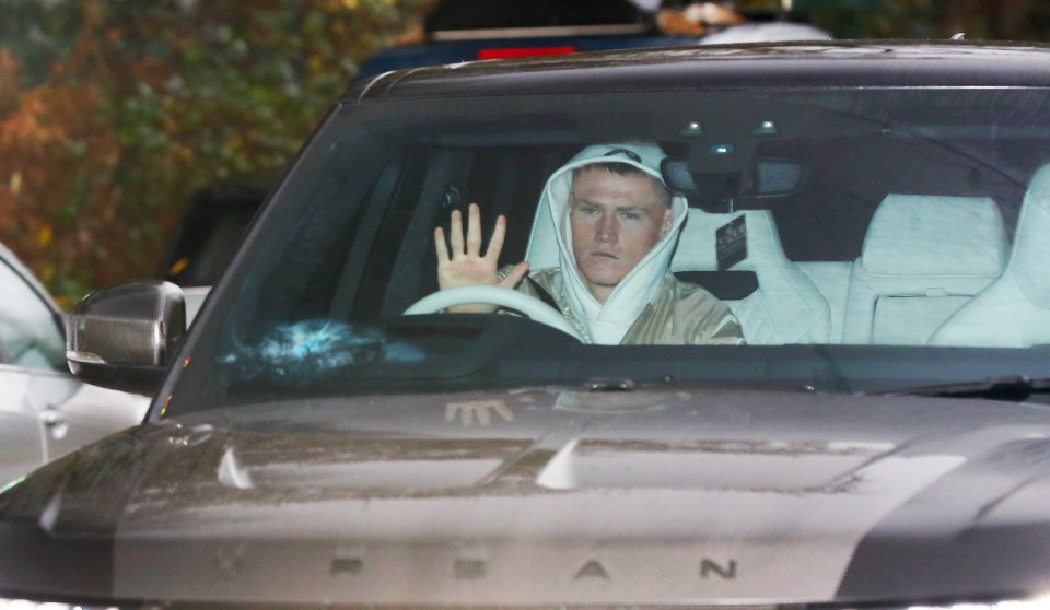 Scott McTominay had a stoney face wearing his hood up driving his Range Rover