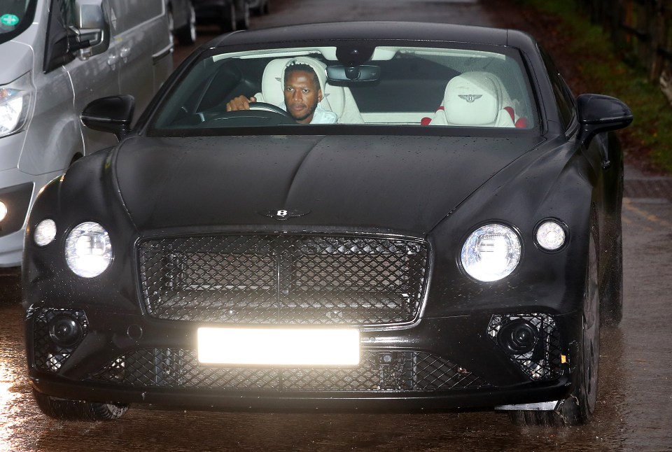 Fred rolled in through the Manchester rain in his black Bentley