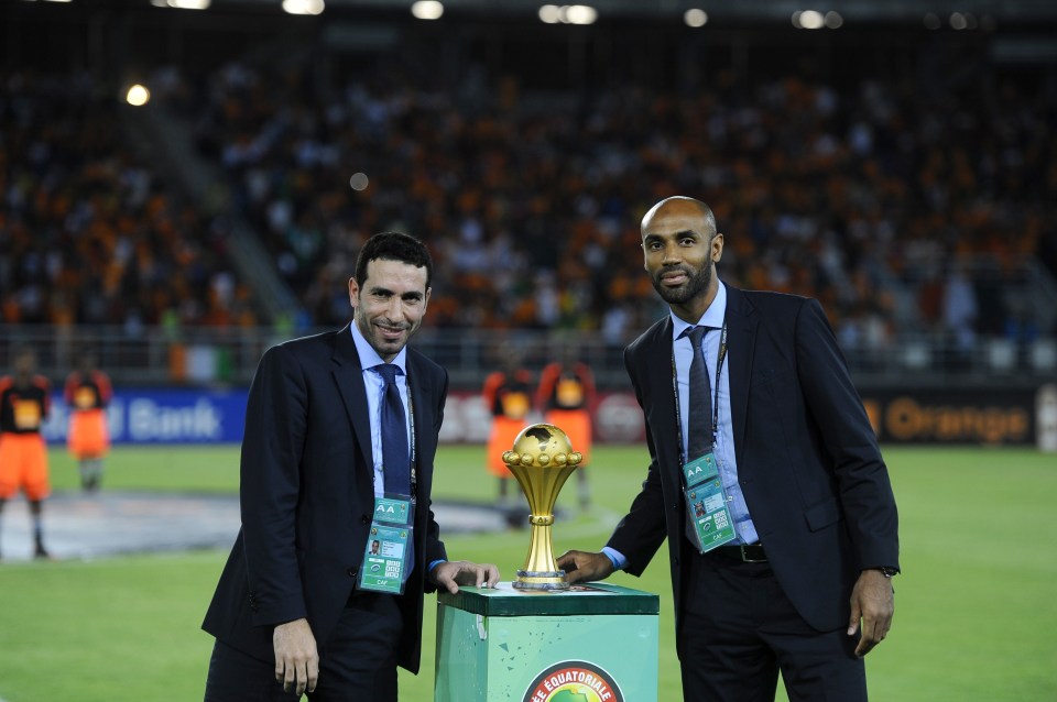 Egyptian Mohamed Aboutrika, left, and Frederic Kanoute