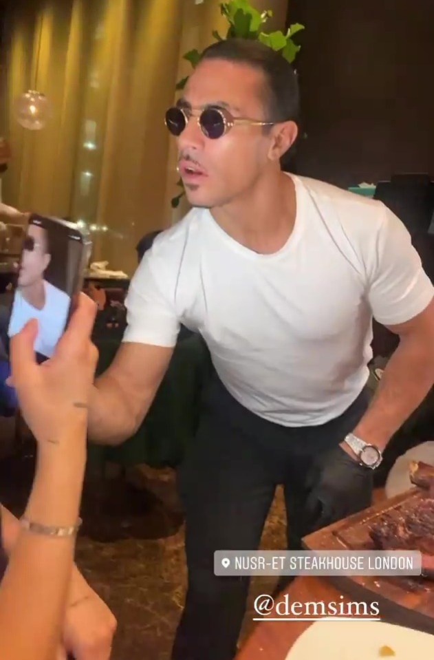 Salt Bae was seen performing his signature salt-sprinkling routine at the table