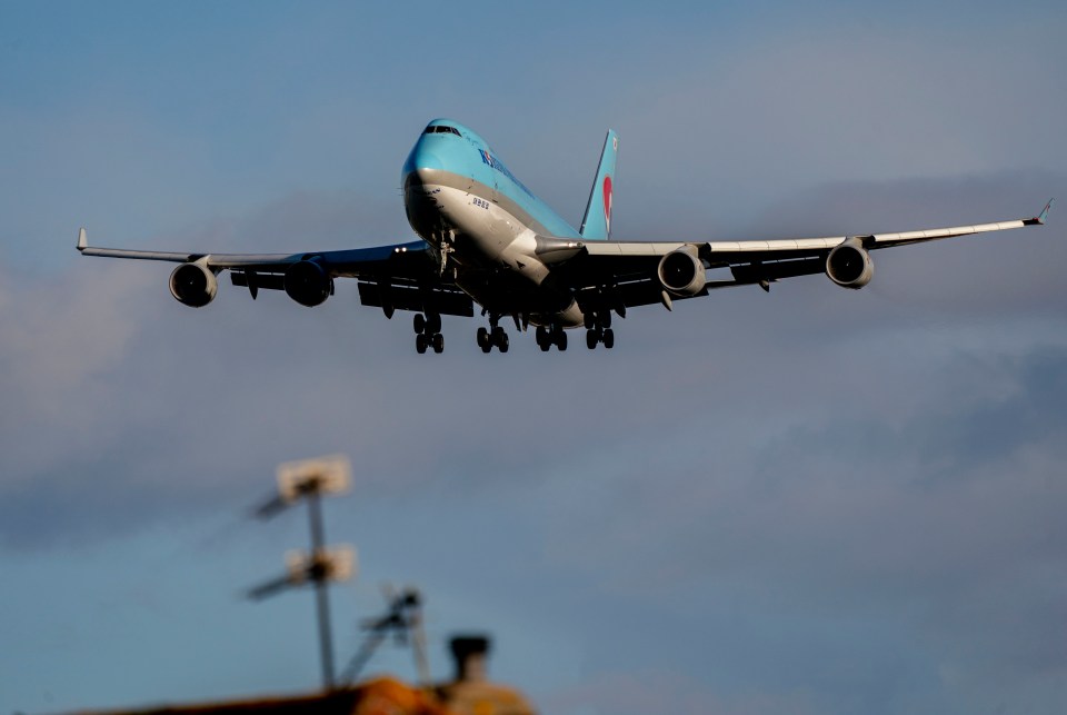 Korean Air Cargo flight KE9503 pictured landing today at London Heathrow Airport packed full of PlayStation 5s