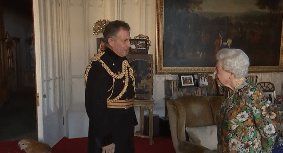 Gen Sir Nick, who is stepping down from his role, is seen entering the room to be greeted first by the Queen's inquisitive elderly dorgi Candy