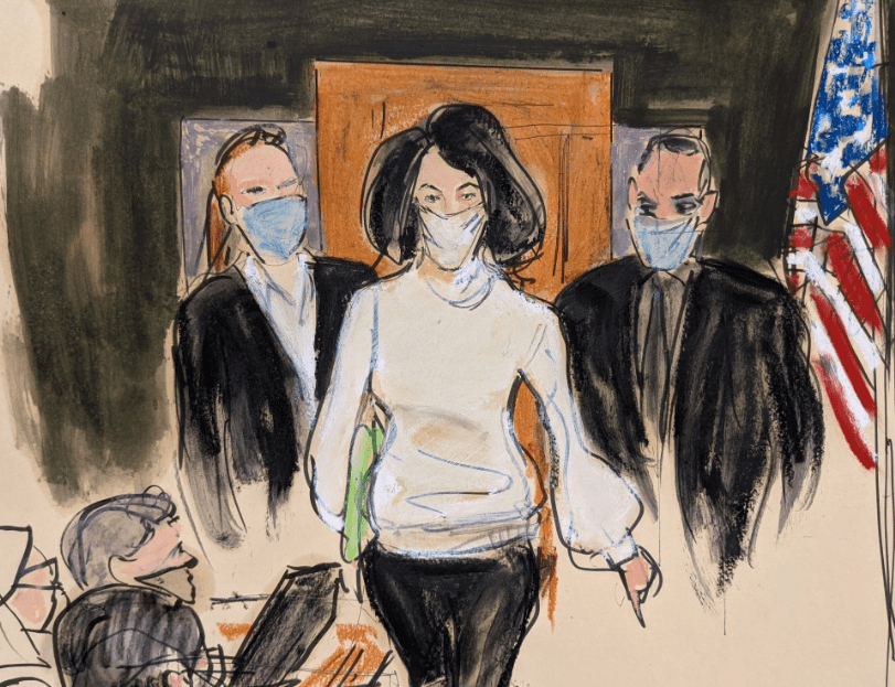 Maxwell enters the courtroom escorted by US Marshalls at the start of her trial