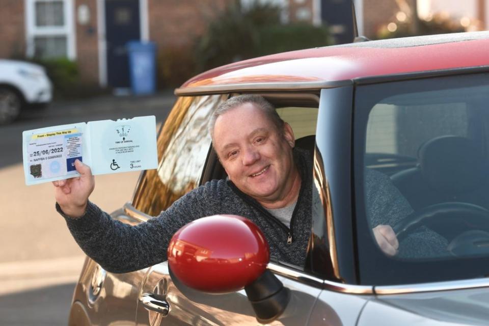 A disabled driver who left his car for less than two minutes to read a parking sign was dragged to court by a private parking company