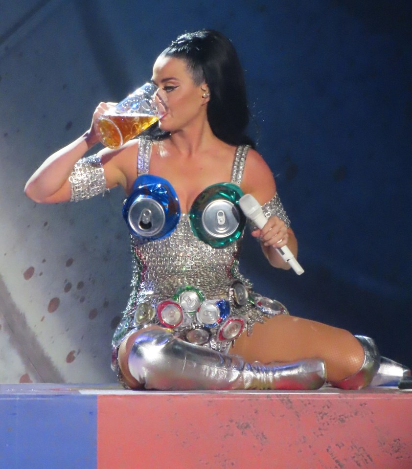 Katy paused the show to chug a pint of beer she had 'lactated' from her beer-can chest apparatus just seconds earlier