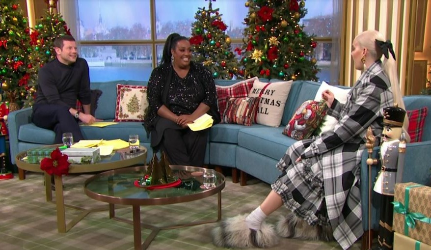 Alison Hammond quickly addressed the elephant in the room as the pop star donned the unique slippers