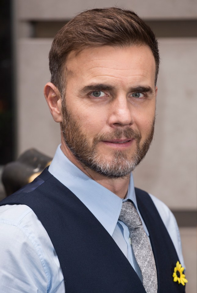 Gary Barlow seems to have put rumoured bad blood with Simon Cowell behind him