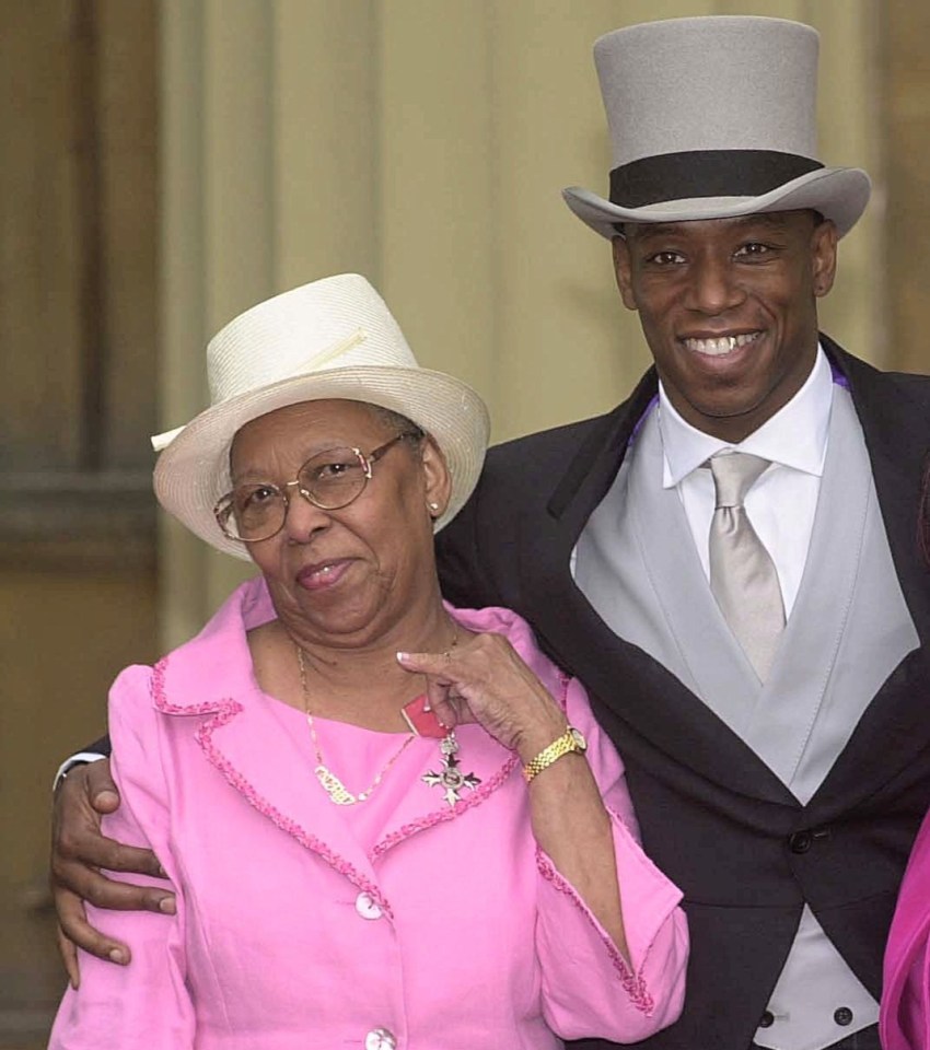 Ian Wright pictured with his mum, as he collected his MBE in 2000