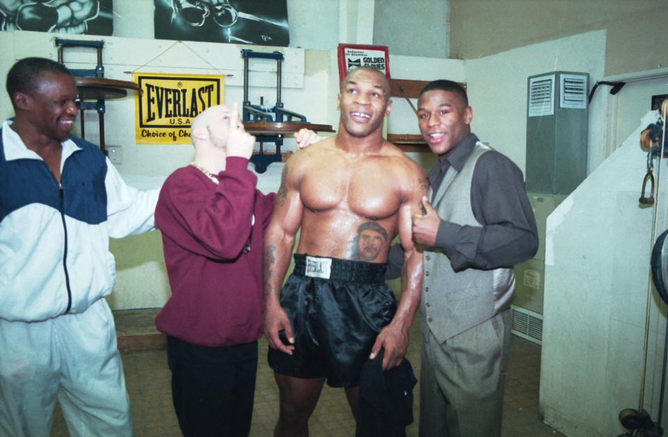 A young Tyson in the gym with an even younger Floyd Mayweather