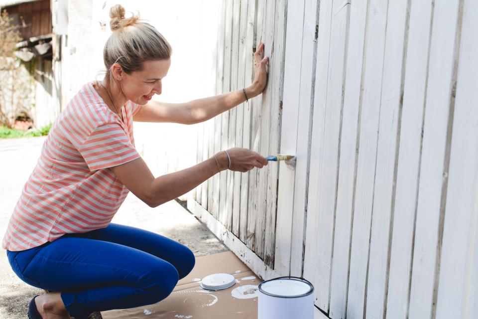 Painting your fence with lighter colours will give off the illusion of a bigger garden