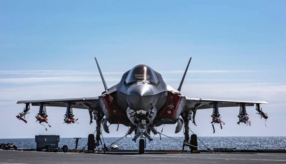 The wreck of a £100million jet which crashed on take-off from a Royal Navy aircraft carrier has been dredged up from the seabed