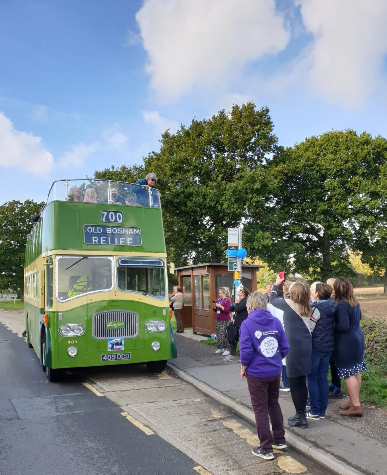 Penny’s family and friends were waiting for her in a vintage open-top bus to finish the final 12 miles home