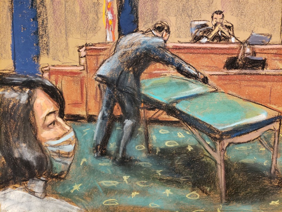 Ghislaine Maxwell watching as Epstein’s massage table was brought into court