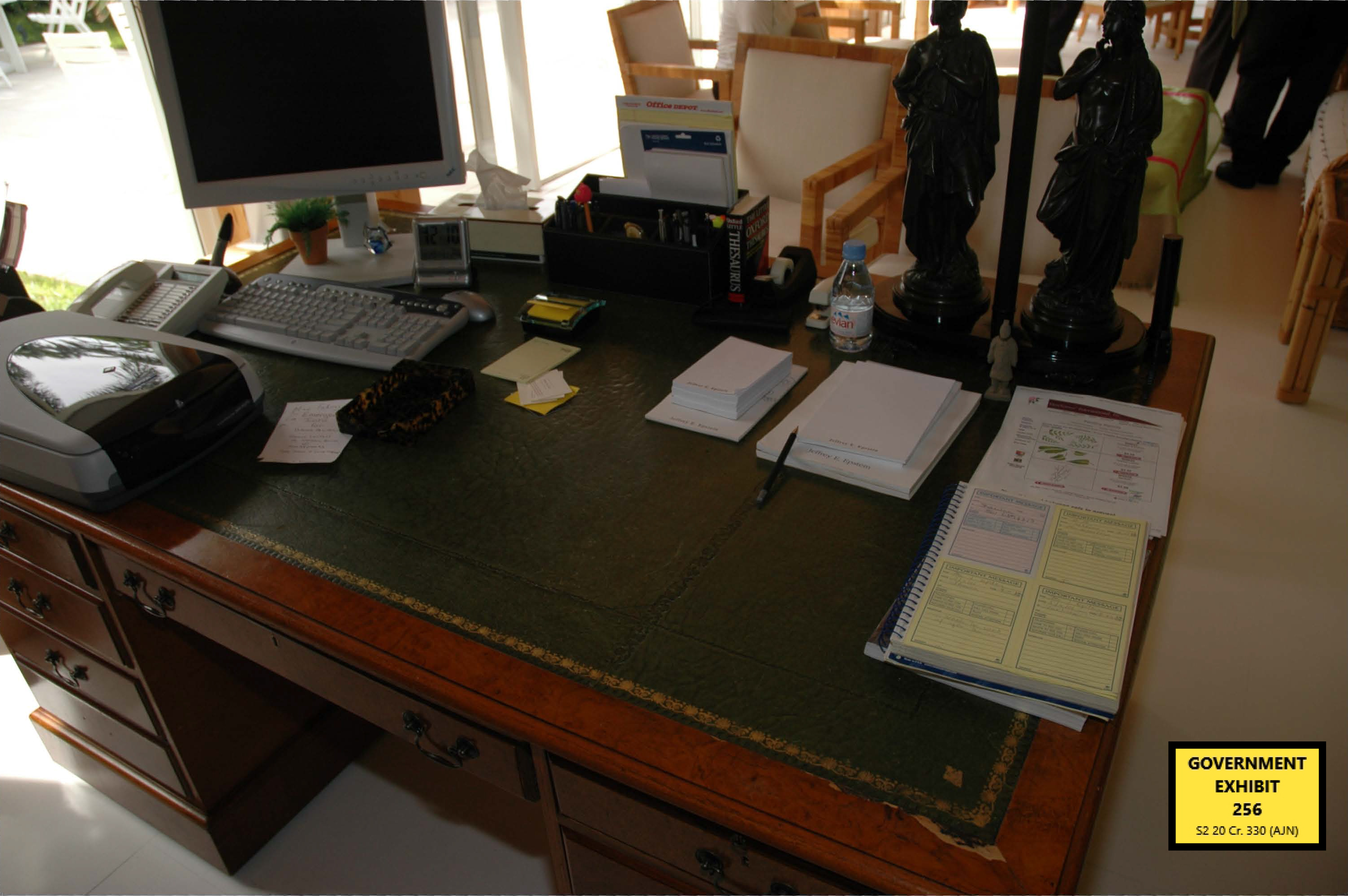 Epstein's named stationary is sitting on the desk