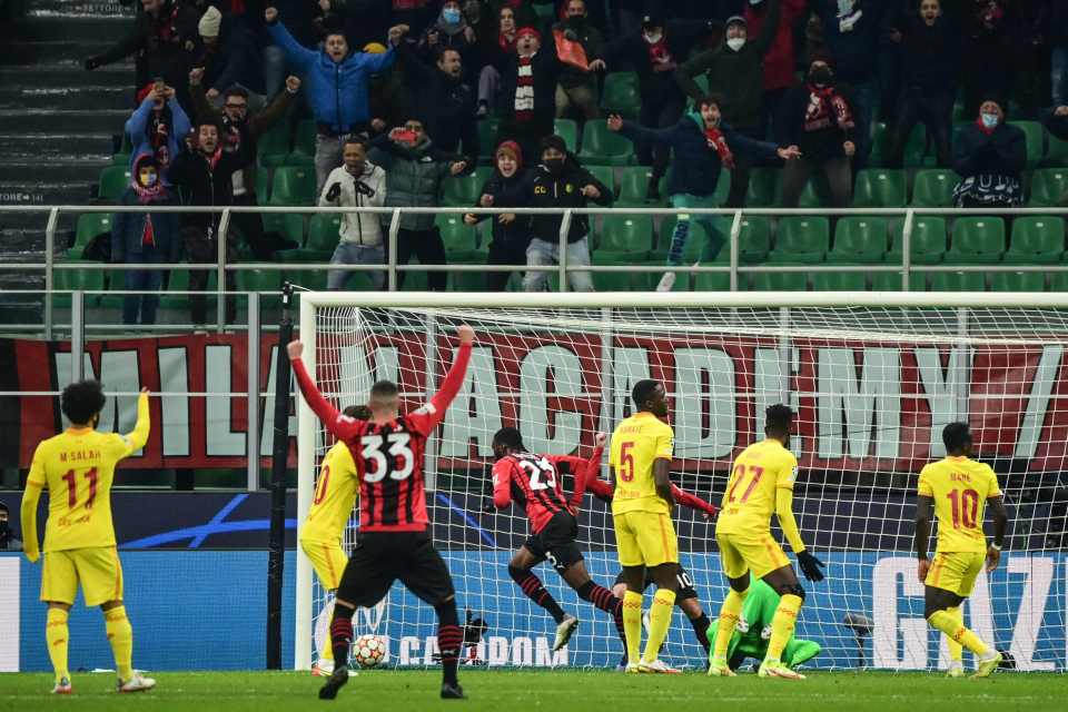 AC Milan celebrate after Fikayo Tomori grabs the opener against Liverpool