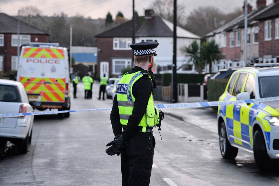 Police cordoned off a street in Greater Manchester earlier today