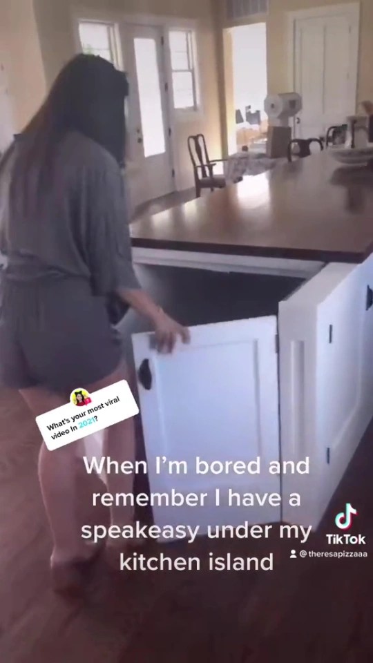 TikTok user @theresapizzaaa showed how she has a secret bar hidden behind a cabinet door