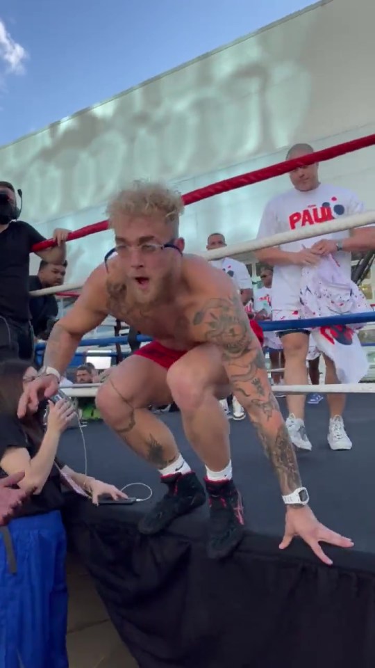 Jake Paul began swimming with shoes on in his open workout